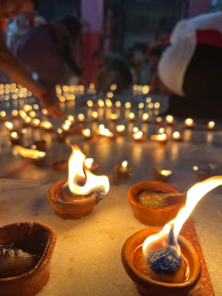 Sacred fire ceremony with diyas during Soul Rising yoga Agra India